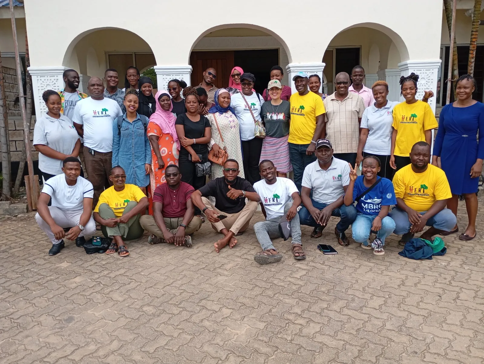 HERI-Kenya members and staff gathered together in HERI T-shirts